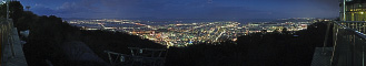 眉山からのパノラマ夜景写真（日没直後）